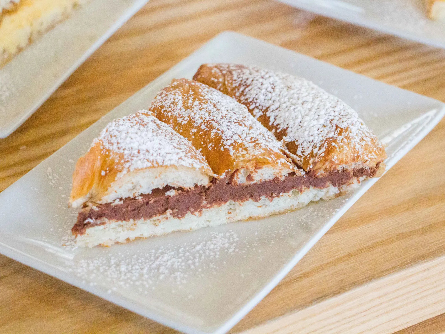 Ensaimada rellena de chocolate Elaborada de manera tradicional con ingredientes de primera calidad. N / 350 G median